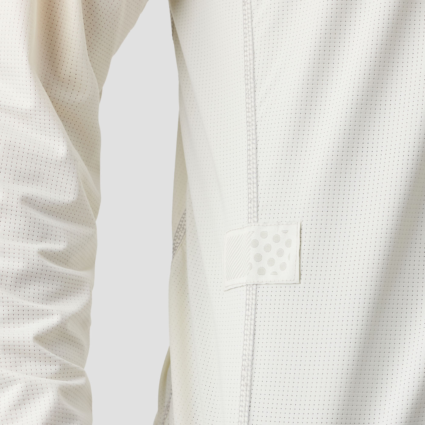 Side view of men's Oat UV Trail Shirt by Ornot, UPF 30 sun protection cycling top cut and sewn in California