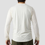 Back view of Ornot Men's UV Trail Shirt in Oat, loose-fit long sleeve UV shirt for cycling, gravel, and adventure