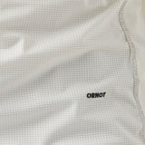 Detail of men's cream UV Trail Shirt fabric by Ornot, lightweight breathable material with UPF 30 sun protection