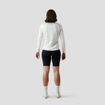 Women's UV Trail Shirt in Oat laid flat, Ornot's long sleeve sun shirt for gravel riding and warm weather cycling