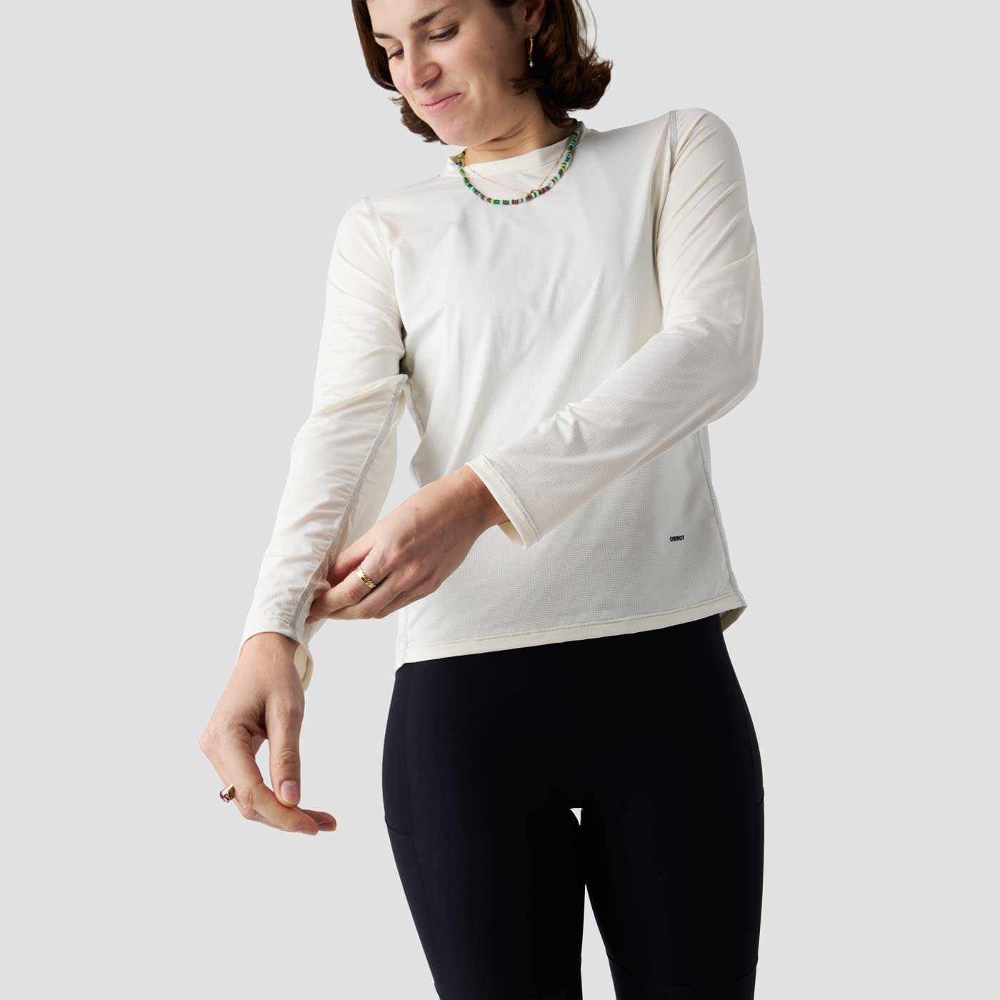 Ornot Women's UV Trail Shirt in Oat cream, breathable technical shirt for gravel cycling and hot weather rides